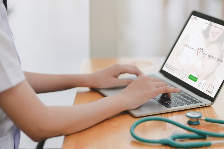 a doctor with laptop