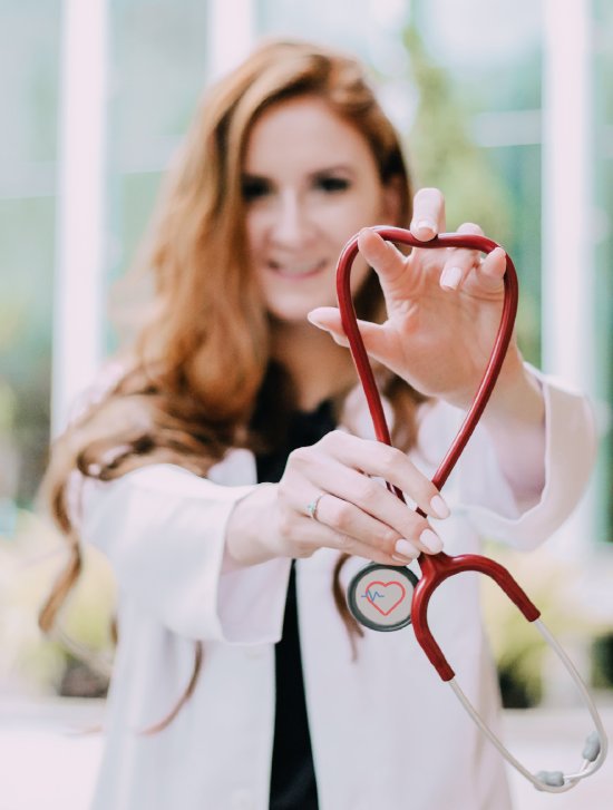 a woman with stethoscope